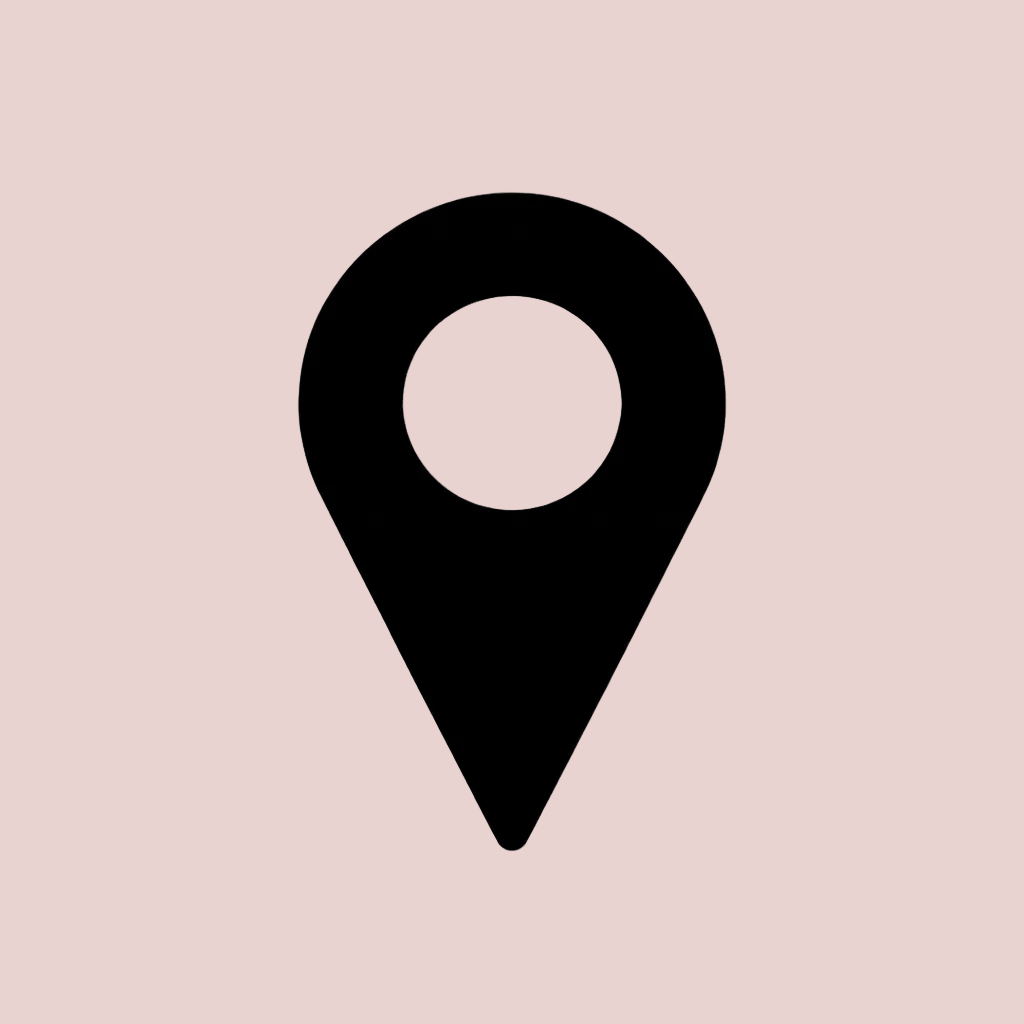 A solid black location pin icon centered on a transparent checkerboard background.
